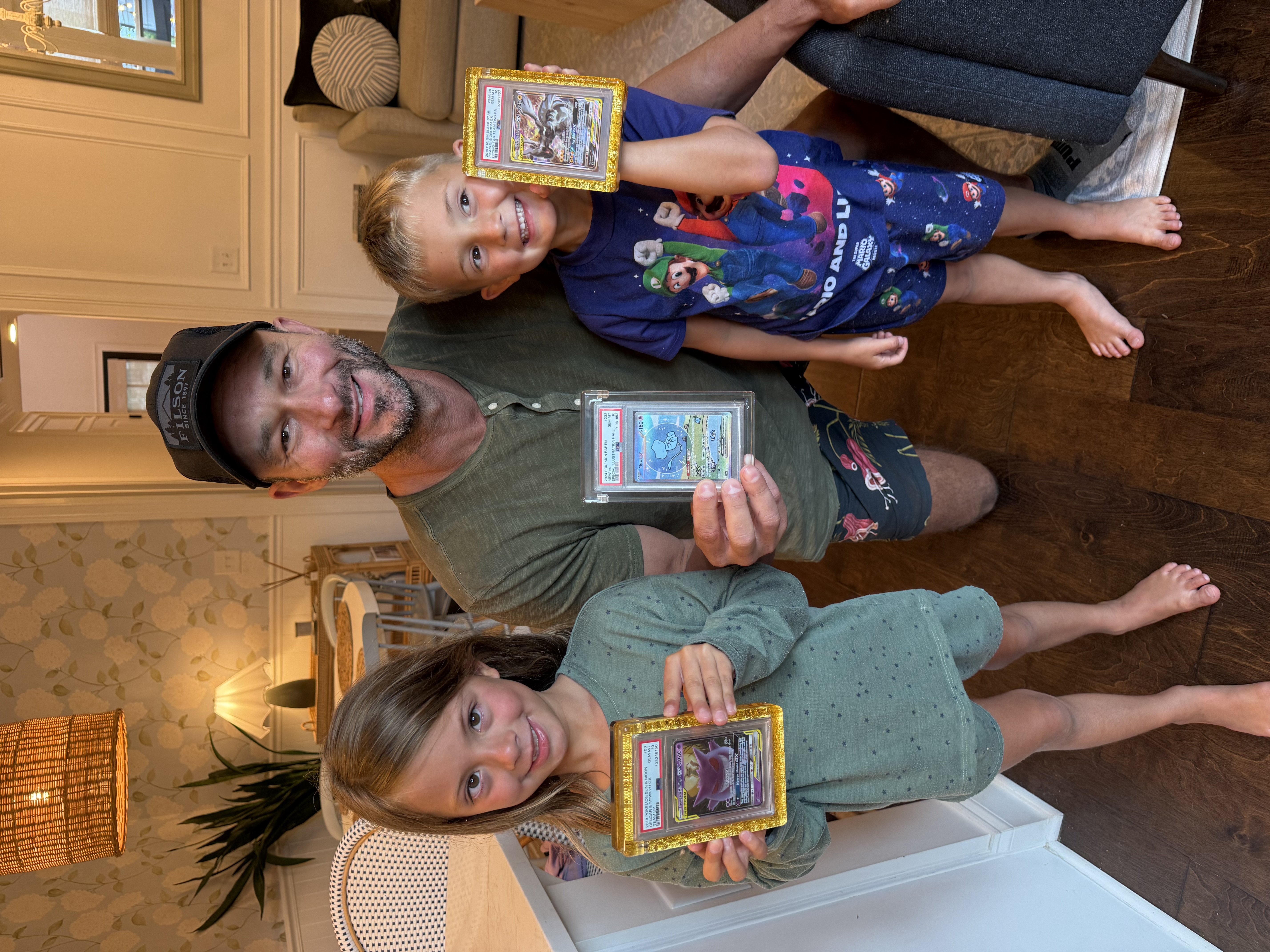Michael Manter and family with their Pokémon card collection